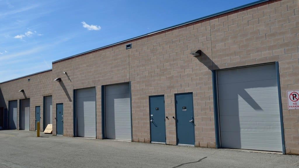 Commercial sectional garage doors on a warehouse